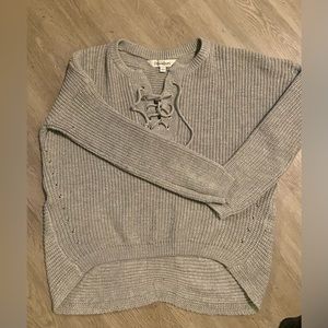 Super cute  hi/low style top.  size L